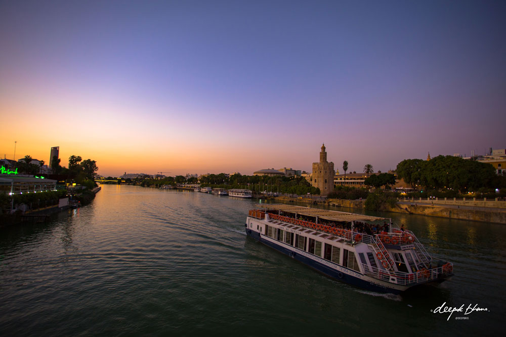 Boat-on-river-Seville-Spain