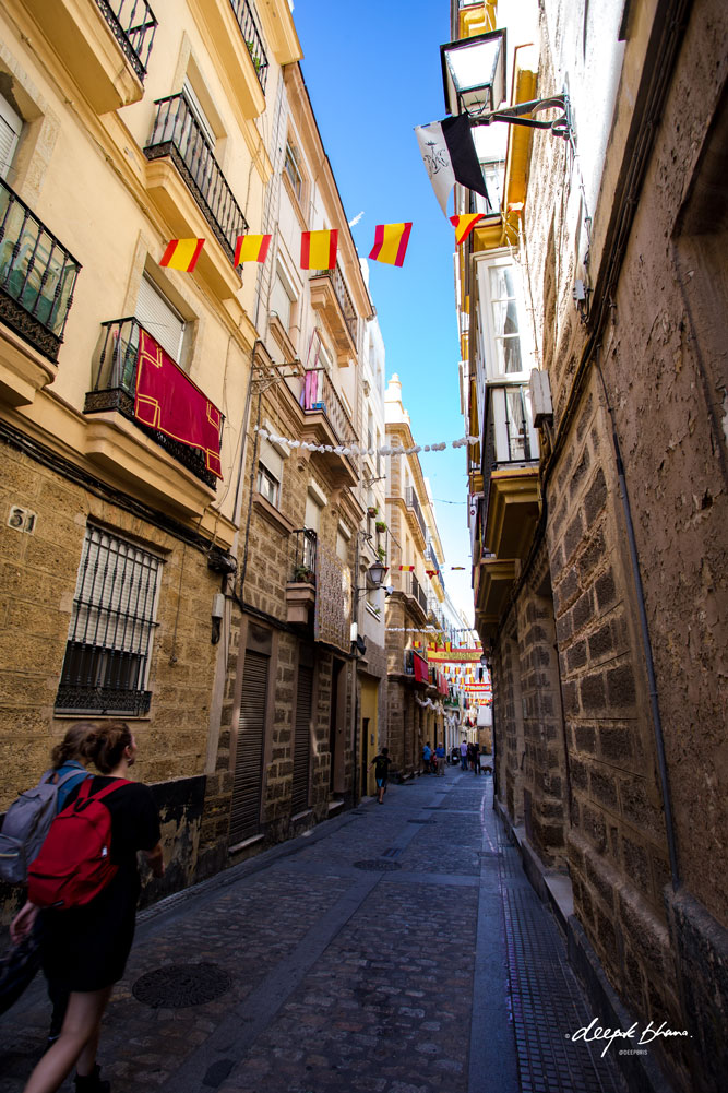 Cadiz-Spain-street-flags-tourists